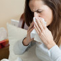 Woman in bed feeling cold